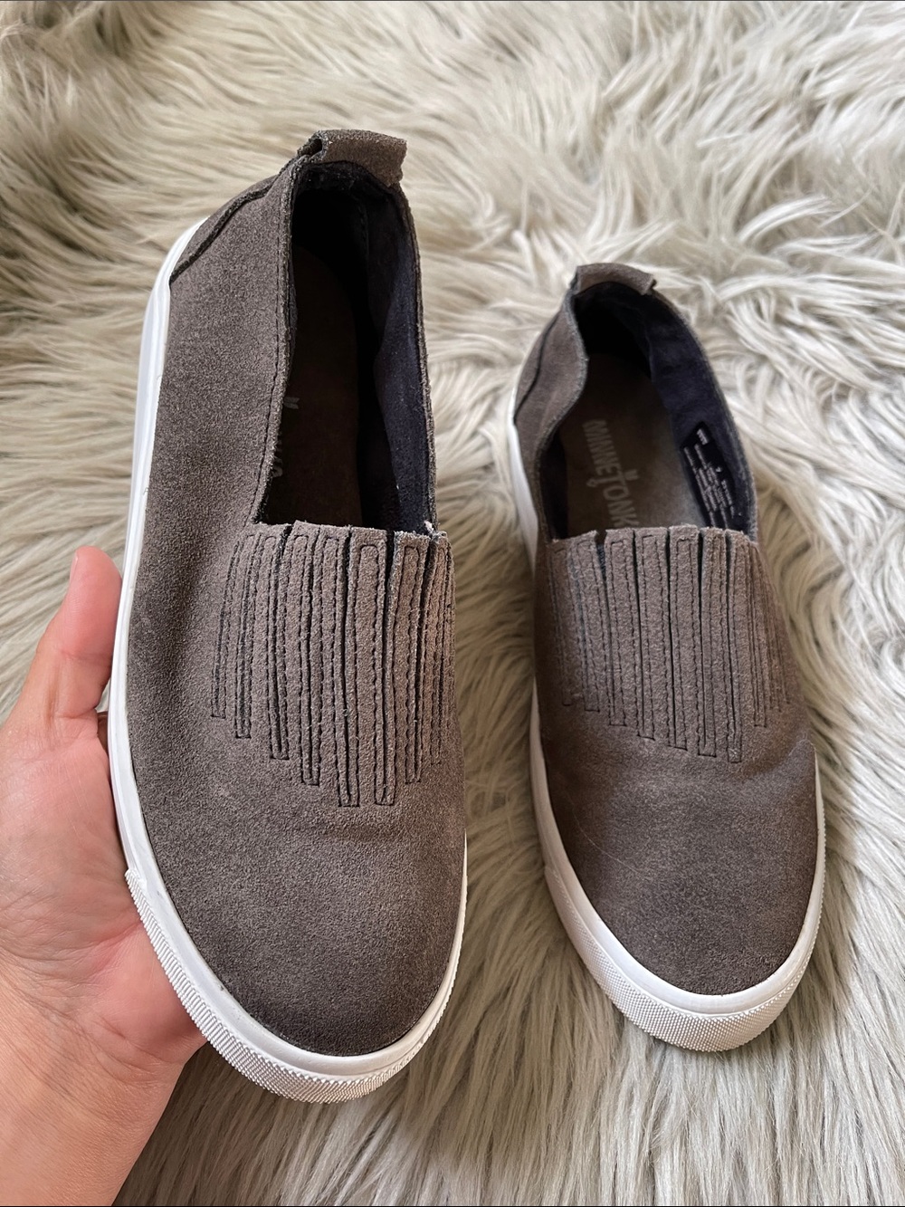 Minnetonka Taupe Suede Fringe Slip-Onβ Loafers